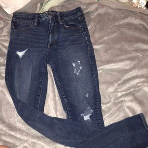 Ripped dark wash jeans